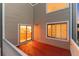 Outdoor deck with sliding door access to inside with wood decking and views of the surrounding environment at 15565 Flowerhill Cir, Parker, CO 80134