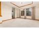 Dining room area featuring natural light, and decorative columns at 15565 Flowerhill Cir, Parker, CO 80134