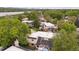Aerial view of the community showcasing mature trees and serene water views at 1799 S Lee St # B, Lakewood, CO 80232