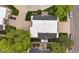 Bird's eye view displays roof and layout with two patios and adjacent yard space at 1799 S Lee St # B, Lakewood, CO 80232