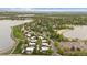 Aerial view displaying neighborhood near lake and recreational areas, perfect for outdoor enthusiasts at 1799 S Lee St # B, Lakewood, CO 80232