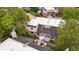 Aerial view of home featuring private back patio, lush landscaping, and fenced yard at 1799 S Lee St # B, Lakewood, CO 80232