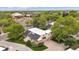 Aerial view of community with manicured lawns, mature trees, and convenient parking at 1799 S Lee St # B, Lakewood, CO 80232