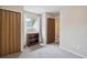 This bedroom has neutral paint, carpet and an adjacent closet and features ample natural light at 1799 S Lee St # B, Lakewood, CO 80232
