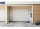 Attached one-car garage offering secure parking and easy access to the home at 1799 S Lee St # B, Lakewood, CO 80232