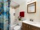 Clean bathroom with a tub shower combination and wood vanity at 9250 E Girard Ave # 8, Denver, CO 80231