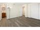 Bright bedroom with laminate wood flooring and mirrored closet doors at 9250 E Girard Ave # 8, Denver, CO 80231