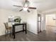 Small dining area with breakfast bar and view into kitchen at 9250 E Girard Ave # 8, Denver, CO 80231