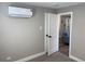 Bright bedroom with a modern split system for heating and cooling at 1263 N Willow St, Denver, CO 80220
