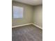 Cozy bedroom with neutral carpet and ample natural light at 1263 N Willow St, Denver, CO 80220