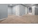 Basement featuring carpet flooring, recessed lighting, and two closet doors at 3389 Willowrun Dr, Castle Rock, CO 80109