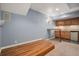 Finished basement area featuring a wet bar, carpet, and ample space for recreation at 3389 Willowrun Dr, Castle Rock, CO 80109