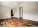 Spacious main bedroom with an ensuite bathroom, hardwood floors, and ample natural light at 3389 Willowrun Dr, Castle Rock, CO 80109