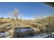 Beautiful view of the yard and open space from the home at 6491 Barnacle Ct, Boulder, CO 80301
