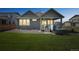 Backyard with hot tub and outdoor patio that enhances evening relaxation at 17788 Olive St, Broomfield, CO 80023