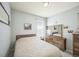 Cozy bedroom with carpet flooring, a neutral color palette, natural light, and tasteful decor at 17788 Olive St, Broomfield, CO 80023
