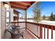 Balcony with two chairs and views of the winter landscape at 303 Pelican Cir # 1901, Breckenridge, CO 80424