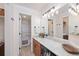 Clean bathroom featuring granite countertops, modern lighting, and shower at 303 Pelican Cir # 1901, Breckenridge, CO 80424