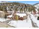 Beautiful multi-level condo in the mountains with snow and trees surrounding the property at 303 Pelican Cir # 1901, Breckenridge, CO 80424