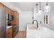 Kitchen area with stainless steel appliances and stone countertops at 303 Pelican Cir # 1901, Breckenridge, CO 80424