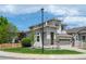 Charming two-story home with stone accents and a well-maintained front yard at 10685 Cherrybrook Cir, Highlands Ranch, CO 80126