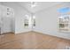 Bright living room with vaulted ceilings, hardwood floors, and ample natural light at 10685 Cherrybrook Cir, Highlands Ranch, CO 80126