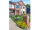 Beautifully landscaped front yard with vibrant flowers and a classic brick mailbox, enhancing curb appeal at 12752 W Dakota Ave, Lakewood, CO 80228