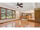 Spacious living room featuring hardwood floors, recessed lighting, and backyard views at 12752 W Dakota Ave, Lakewood, CO 80228