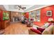 Cozy living room with hardwood floors, fireplace, and built-in bookshelves at 12752 W Dakota Ave, Lakewood, CO 80228