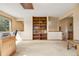 Versatile bonus room with large window, built-in shelving and natural light at 4992 White House Trl, Evergreen, CO 80439