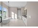 Luxurious bathroom featuring a soaking tub, sleek fixtures, and modern design for ultimate relaxation at 8014 Trinity Peak Ln, Castle Rock, CO 80108