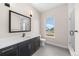 Bright bathroom with a large vanity and shower at 8014 Trinity Peak Ln, Castle Rock, CO 80108
