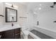 Modern bathroom with a glass shower and dark wood vanity at 8014 Trinity Peak Ln, Castle Rock, CO 80108