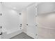 Well-lit bathroom offers a soaking tub with a shower and ceramic subway tiles, coupled with an open door at 8014 Trinity Peak Ln, Castle Rock, CO 80108
