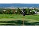 View of a beautiful fairway on the golf course with mountain views at 8014 Trinity Peak Ln, Castle Rock, CO 80108