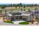 Beautiful home with a stone and stucco exterior and three-car garage at 8014 Trinity Peak Ln, Castle Rock, CO 80108