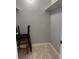 Empty walk-in closet offers storage potential with basic shelving at 1011 S Ironton St # 107, Aurora, CO 80012