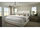 Comfortable main bedroom filled with natural light and a neutral color palette at 21004 E 63Rd Dr, Aurora, CO 80019
