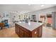 Open-concept kitchen with a large island, seamlessly connecting to the living area, perfect for entertaining at 3375 N Willow St, Denver, CO 80238