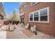 Charming backyard patio with seating area perfect for outdoor entertaining at 3375 N Willow St, Denver, CO 80238