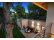 Backyard with a patio, outdoor seating, barbecue, and privacy fence at 2377 S Humboldt St, Denver, CO 80210