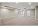 Large, finished basement with recessed lighting, neutral carpet, and plenty of open space at 2377 S Humboldt St, Denver, CO 80210