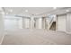 Finished basement featuring recessed lighting, neutral carpet, with a staircase at 2377 S Humboldt St, Denver, CO 80210