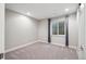 Finished bedroom featuring recessed lighting, neutral carpet, and egress window at 2377 S Humboldt St, Denver, CO 80210