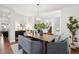 Cozy dining room with contemporary design elements, decorative lighting, and neutral tones at 2377 S Humboldt St, Denver, CO 80210