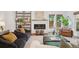 Inviting living room with cozy seating, fireplace, and stylish decor at 2377 S Humboldt St, Denver, CO 80210