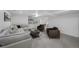 Spacious finished basement featuring plush seating, accent furniture, and a beverage center at 4176 Zenobia St, Denver, CO 80212
