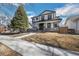Inviting two-story home boasts professional landscaping and striking modern black and white exterior at 4176 Zenobia St, Denver, CO 80212
