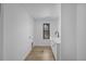 Clean laundry room has storage, a sink, and a window providing natural light at 4176 Zenobia St, Denver, CO 80212