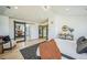 Bright and airy main bedroom with barn door entry to the ensuite bathroom at 4176 Zenobia St, Denver, CO 80212